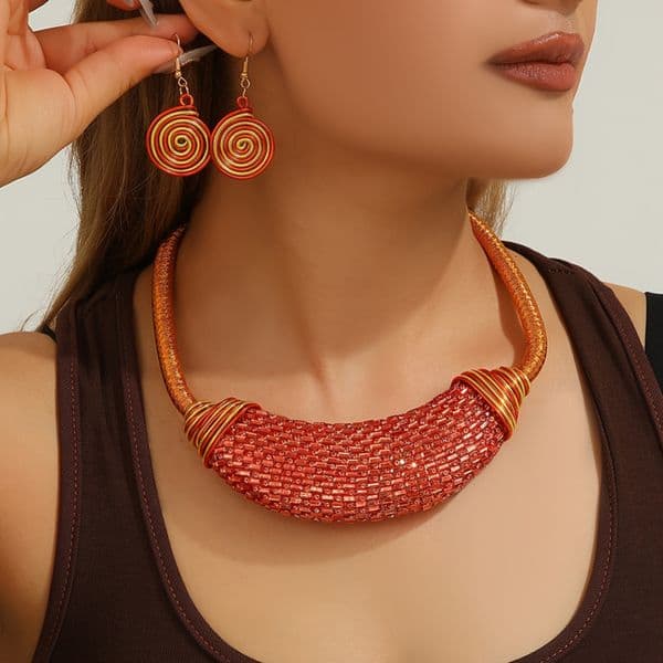 A handmade exaggerated acrylic moon-shaped resin necklace and earrings