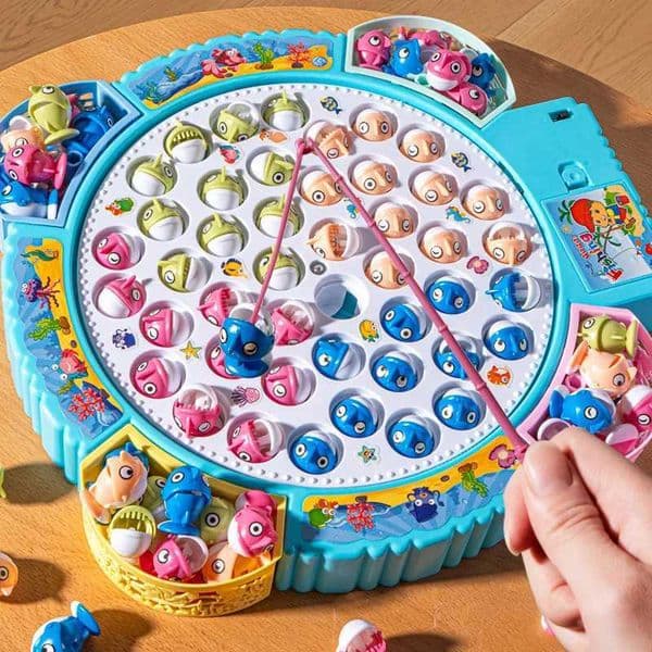 Magnetic fishing toy with magnetic fish and rod spinning fishing game with music available in red and blue and in different sizes W250113