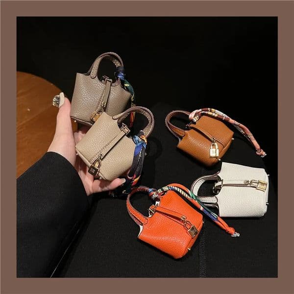 Mini H Home Vegetable Basket Bag Hanging Accessories High Quality Leather Car Keychain Earphone Bag Pendant Wholesale Price 250804