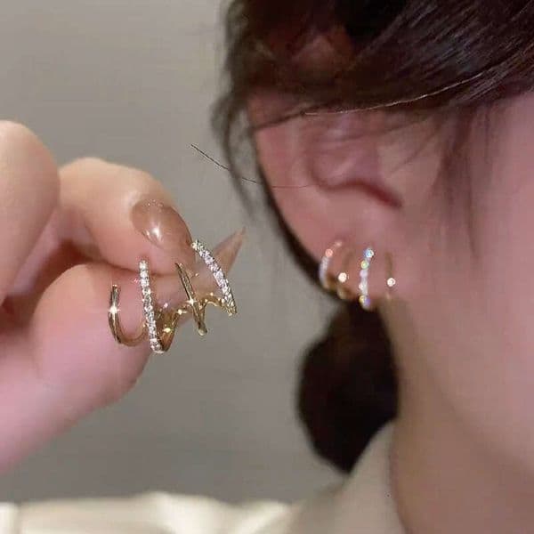 Niche New Design Sense Internet Celebrity for Women Anti-Allergy Sier Needle Fashion Four-Prong Stud 1 Earrings