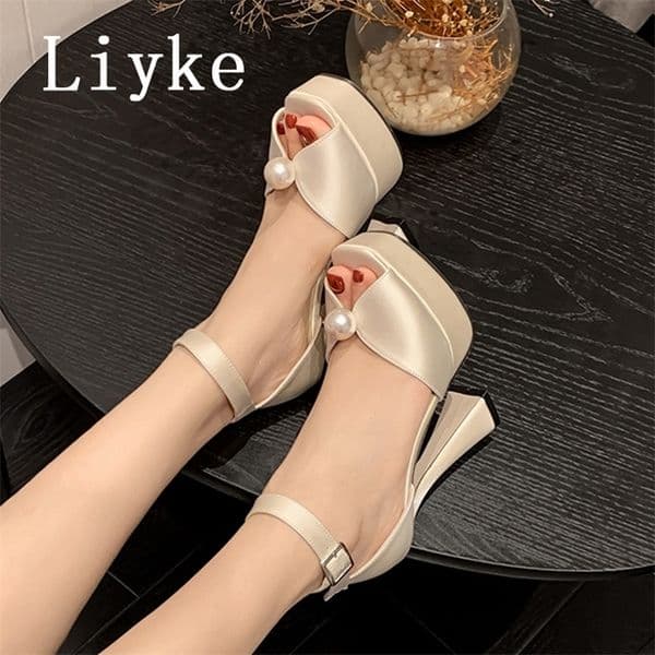 Similar Sexy 13.5CM Super High Heels Platform Sandals Women Summer Fashion White Pearl Peep Toe Wedding Banquet Shoes Women 250228
