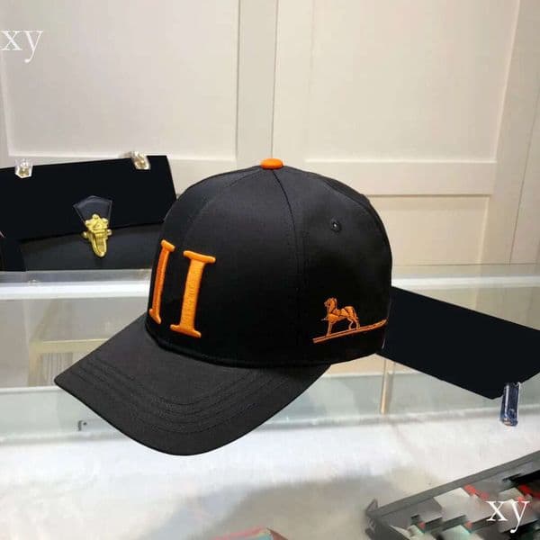 Adjustable brim designer baseball cap Luxury headwear fashion statement Minimalist classic lettering style Stylish unisex sports cap