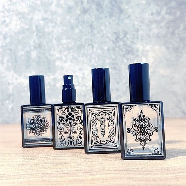 Wholesale charming luxury unique pattern reusable spiral spray empty 15ml glass perfume bottle