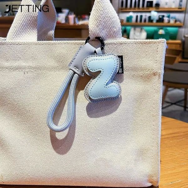 Creative Exquisite 26 English Letter Keychain PU Leather Bag Hanging Charms Alphabet Keyring Ornaments Lucky Pendant Couple Gift 251218