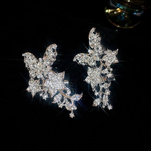 Diamond inlaid butterfly zircon tassel earrings with fashionable temperament no ear holes ear hooks niche exaggerated earrings light luxury highend fee L260515