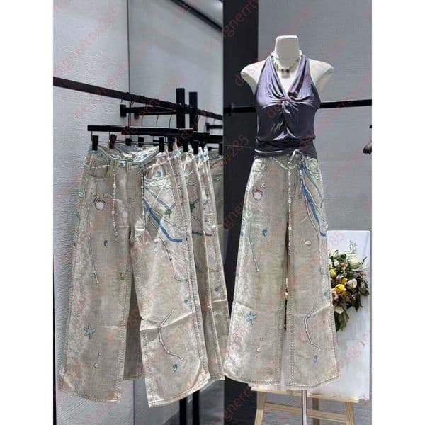 Designer Womens High Waisted Wide Leg Jeans Light Wash Denim Pants with Embroidered Sea Star Shell & Pearl Chain Detail Unique logo Trousers for Casual Vacation Wear