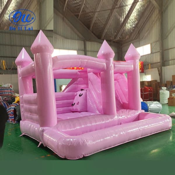 Wholesale pink PVC inflatable trampoline castles, small indoor slide trampoline equipment, PVC children's playgrounds, suitable for weddings, events, parties, etc