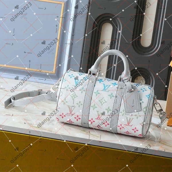 High must have designer handbag keepall bandouli 25CM traveling Womens crossbody shoulder Ultimate luxury quality high capacity shopping bag Tote wallet