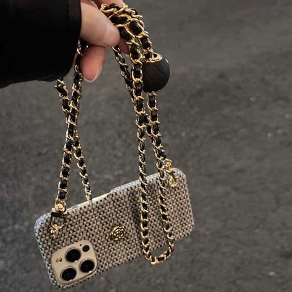Fashionable woven camellia phone case with cross straps suitable for iPhone 15 14 13 12 11 Pro Max anti fall premium girls phone case X250224