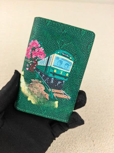 2025 Designer cartoon-printed luxury small holder wallet double-layer Stylish card case girl's small wallet coin purse cute small and light notebook cover designer