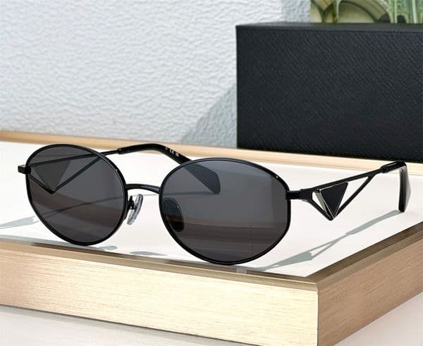 Fashion popular designer 50v sunglasses for women vintage trend oval frame metal sun glasses avant-garde leisure style Anti-Ultraviolet protection Come with case