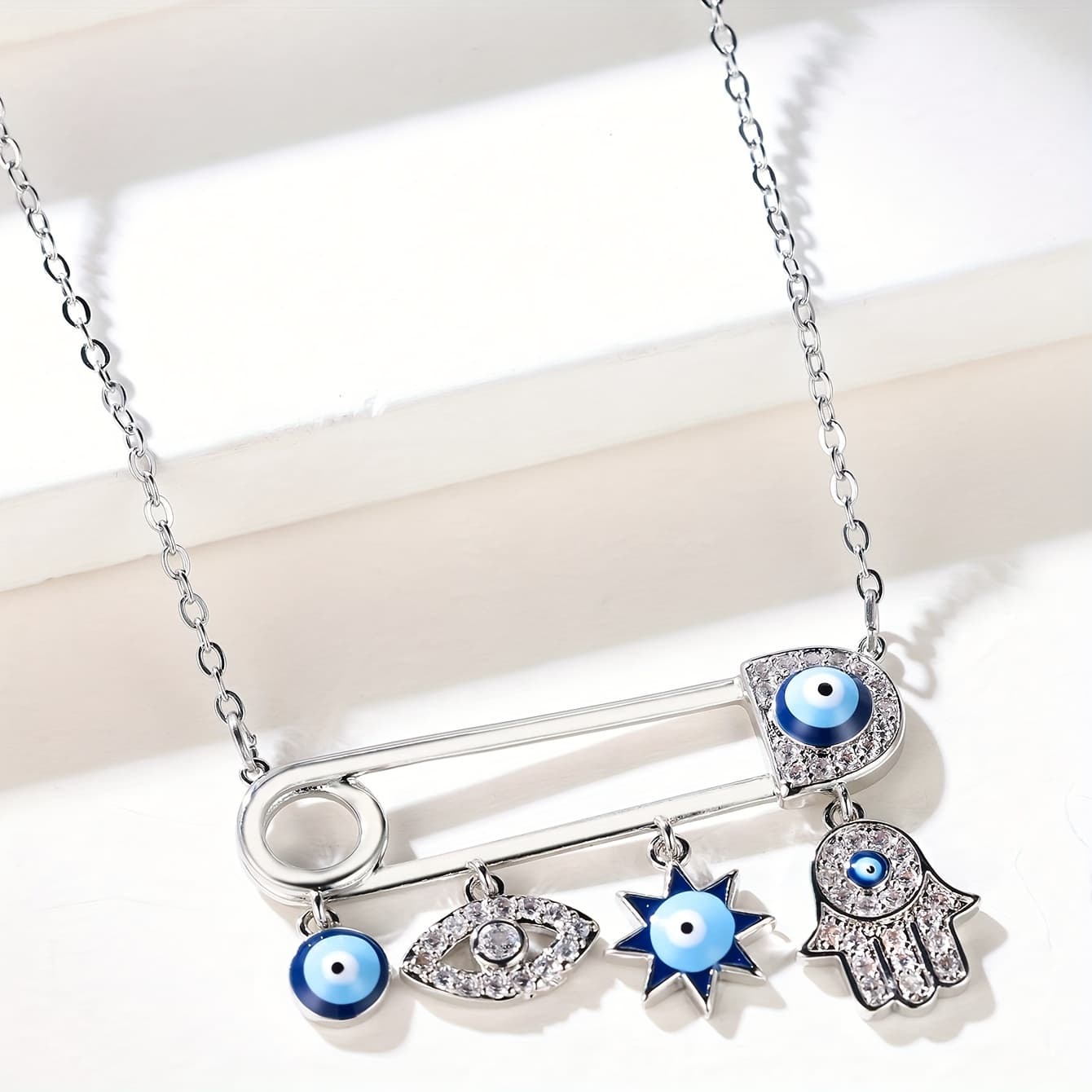TEMU A Fashionable Copper Paperclip Shaped Decorative Palm Eye Pendant Necklace Eye Suitable For Women' Wear