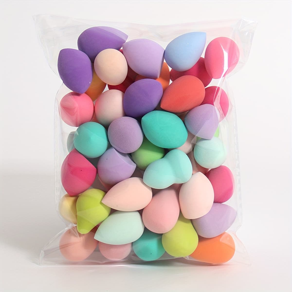 TEMU (0.78*1.18inch) 50pcs Mini Makeup Sponges, Small Beauty Sponge Set For Foundation, Powder, Concealer Highlight,and Eye Shadow Random Colors & Packaging Bag