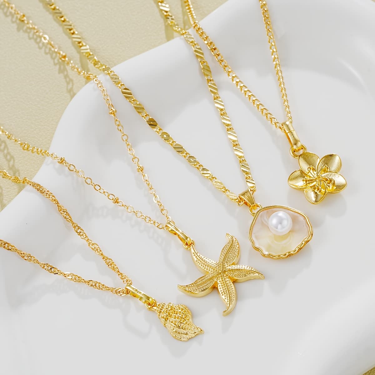 TEMU 4pcs Seaside Beach Bohemian Floral Starfish Seashell Conch Shell Marine Pendant Necklace Multi-piece Set For Holiday Vacation Parties, Dates, And Daily Commuting Wear