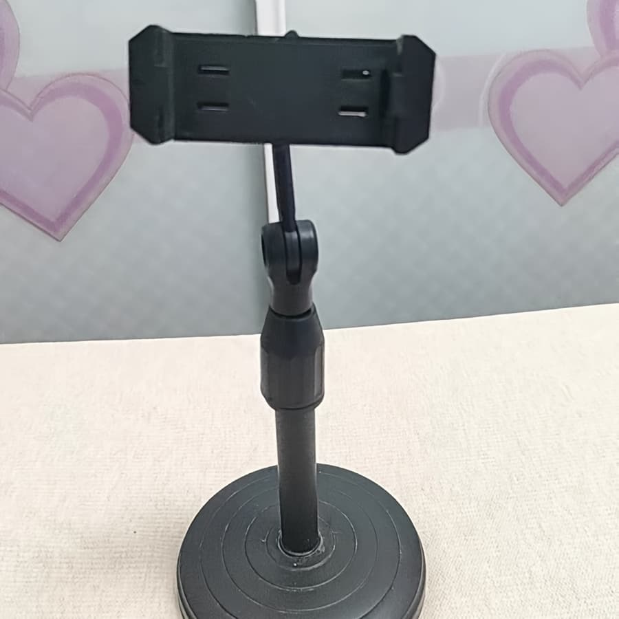 TEMU This Rotatable Universal Phone Holder Features An Adjustable Angle, An , And A Durable Plastic Construction With A . Its Modern, Minimalist Style It Ideal For Home, Office, And Travel Use.
