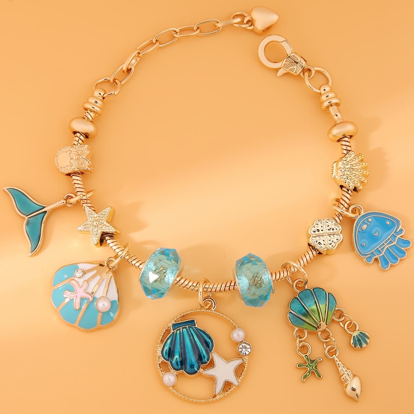 TEMU A Ladies' Pendant Bracelet Featuring Blue , Including Tail, Shell, Jellyfish, And Starfish. Made Of Durable Stainless Steel, This Vintage Accessory Is A Perfect Gift For Her On Valentine's Day
