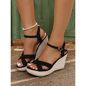 sandales compensées noires pour femmes avec bride à la cheville, semelle espadrille et design croisé pour les tenues d'été et les sorties décontractées
