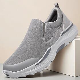 Graue Herren-Slipper zum Hineinschlüpfen, leichtes, atmungsaktives Strickobermaterial, gepolsterte Komfortsohle, moderner Freizeitstil für Alltag und Reisen