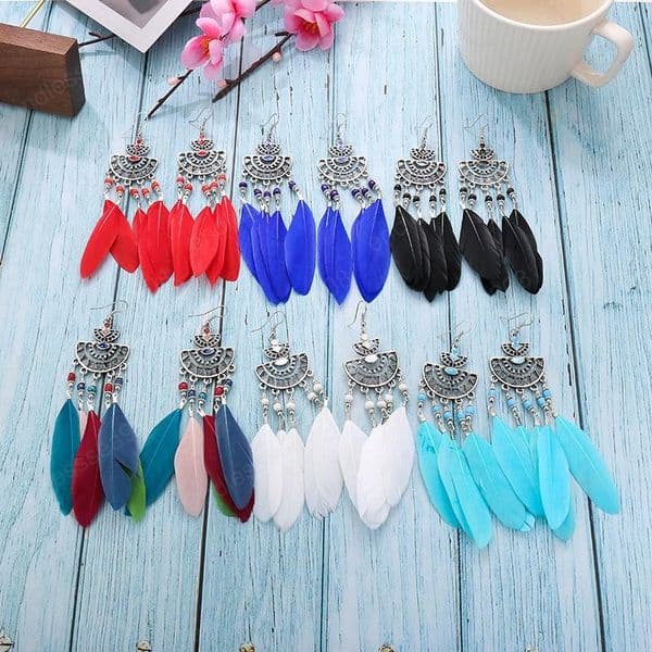 Semicircular retro ethnic style feather earrings female European and American fashion rice beads tassel earrings long burst accessories