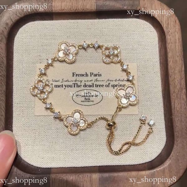 2026 Gold Tone Clover Shaped Link Bracelet Shell & Crystal Accents Elegant Party Daily Wear Gift For Her High Quality And Stylish Jewelry