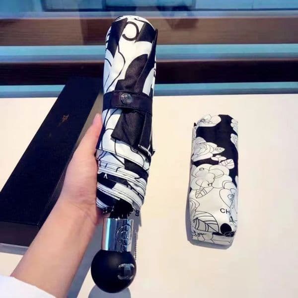 Designer Umbrella Designer Umbrella New Model In luxury 2025 Flower Luxury Letter Printed Black Glue Snow And UV Protection Sun Shade Round Head Fully Automatic — detail 1