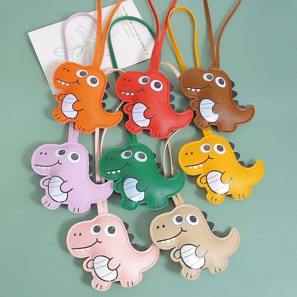 Cross-border MIU series premium leather plush toy cute cartoon little dinosaur pendant, DIY three-dimensional cotton-filled bag decoration