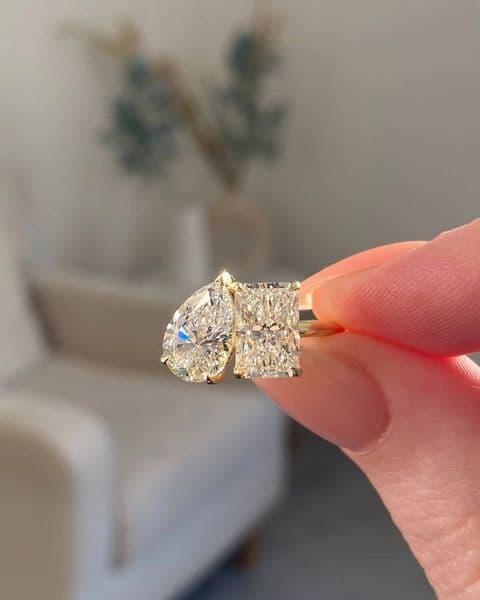 6x9mm pear cut CZ and 6x9mm radiant cut CZ two stone toi et moi engagement ring yellow gold plated modern bypass fine jewelry