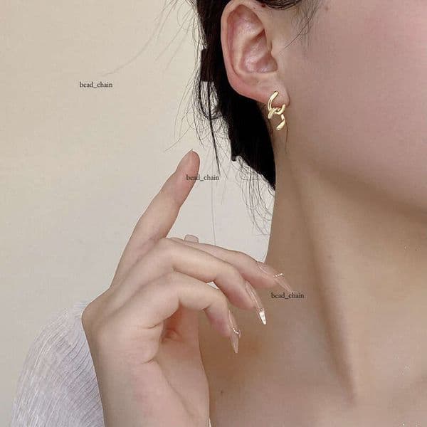 Korean S925 sterling silver twisted cross C-shaped earrings ins-style unique and minimalist recommended by