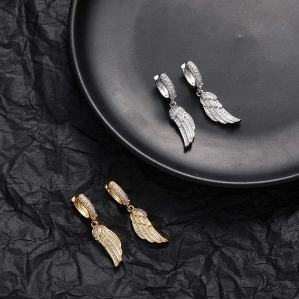 New Hip Hop Style feather three-dimensional ins-style symmetrical dynamic wing studs men's couple earrings