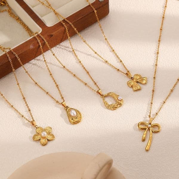 Stainless steel necklace, new pearl pendant, ladies titanium steel 18k gold accessory, bow-shaped jewelry