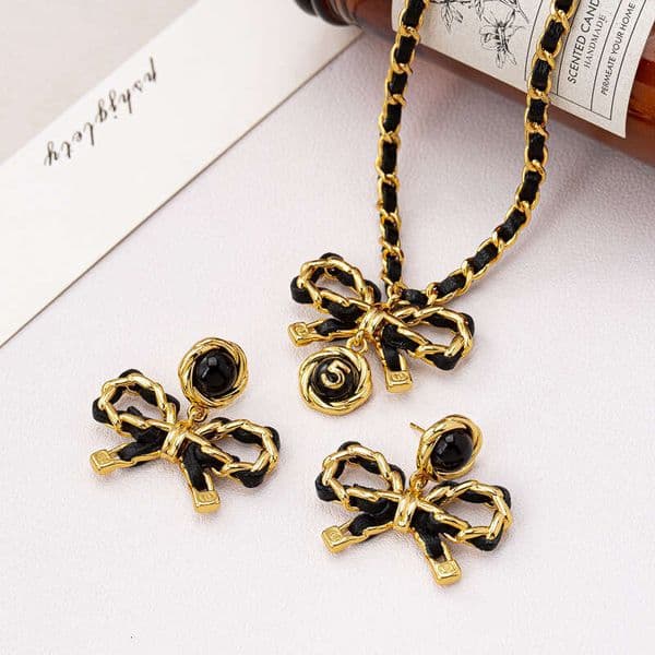 New vintage-style necklace with a touch of luxury, niche leather cord bow high-end earrings, Mother's Day gift
