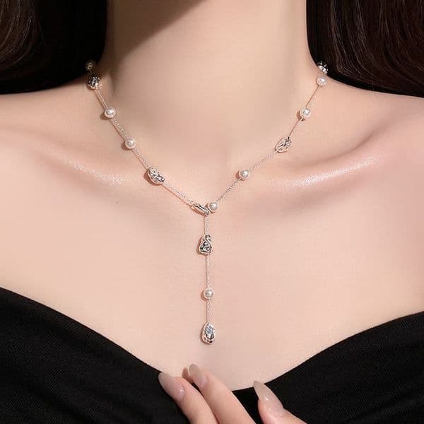 2025 New Hot-Selling Light Luxury Niche High-End Starry Sky Pearl Necklace for Women with Tassel Collarbone Chain Accessories ddmynov