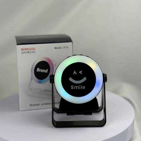 TK mobile phone smile stand speaker with integrated charging desktop foldable portable sensor speaker rotating mobile phone holder Q260423