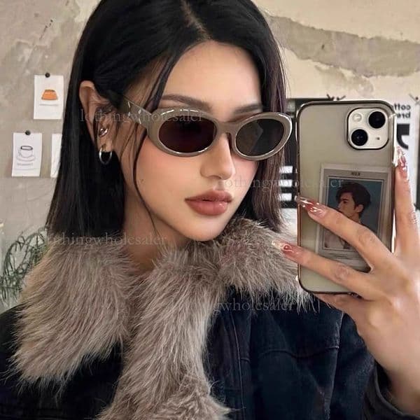 2026 Designer Elliptical Cat Eyes American Hot Girl Sunglasses New Luxury Retro Sunscreen Grey Internet Celebrity Fashionable Sports Outdoor Glasses