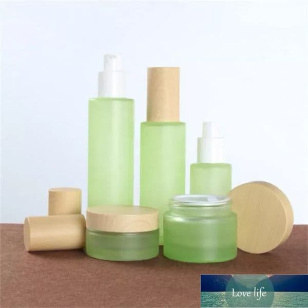 Frosted Green Glass Bottle Cream Jar Spray Lotion Pump Bottles Cosmetic Container with Imitated Wooden Lids