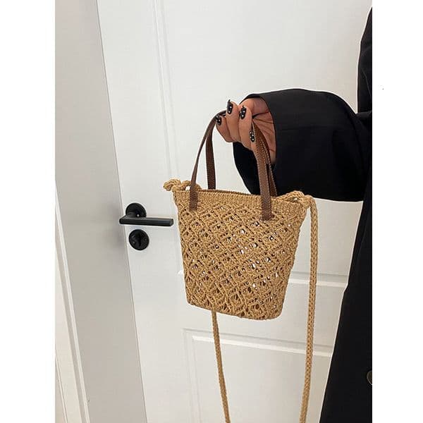 Handheld woven super hot small 2025 new summer countryside style crossbody vacation beach mini bucket bag