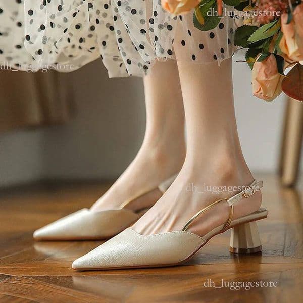 2025 New 10A Luxury designer shoes in black and white Women Shoes High Heel French Design Sense Point Toe Gentle Style Fashion Versatile Free shipping