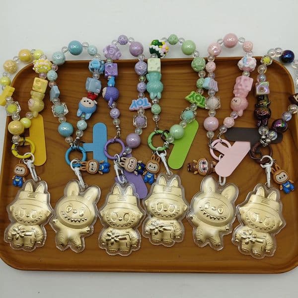 Ship By Sea Gold Labubu Mobile PhoneChain Gold Labubu Cartoon Character Bag Pendant Keychain Hanging Decoration Gift