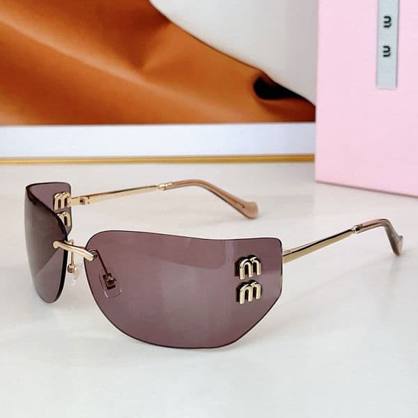 Luxury ultra light frame Womens glasses designer frameless curved lens sunglasses SMUA 50 fashionable 25SS Womens metal sunglasses UV400 protective