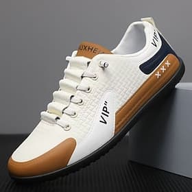 Baskets blanches pour homme, en mesh respirant et cuir, confortables et à lacets, idéales pour la course, la salle de sport et le quotidien.